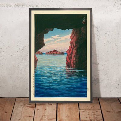 A framed image of Kojaku Cavern at Oga Peninsula by Hasui Kawase, 1935