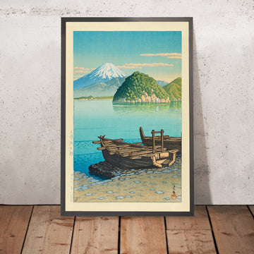 A framed image of Morning at Mitohama Beach with Mt Fuji by Hasui Kawase 1935