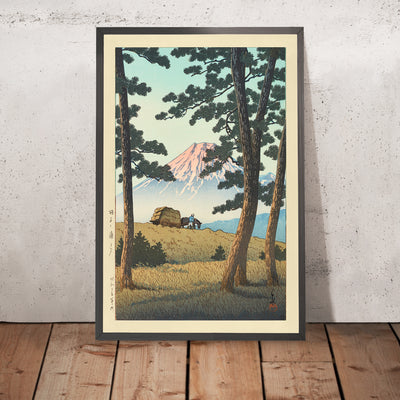 A framed image of Evening at Tago Bay with Mt. Fuji by Hasui Kawase, 1935