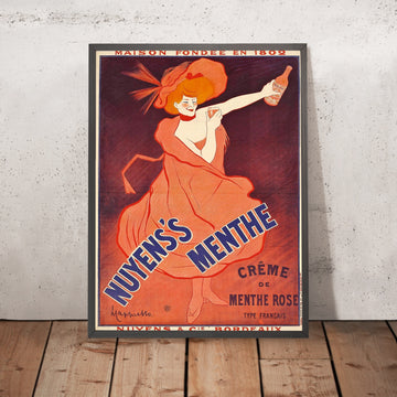 A framed image of Nuyens’s Vintage Crème de Menthe Poster by Leonetto Cappiello, 1922