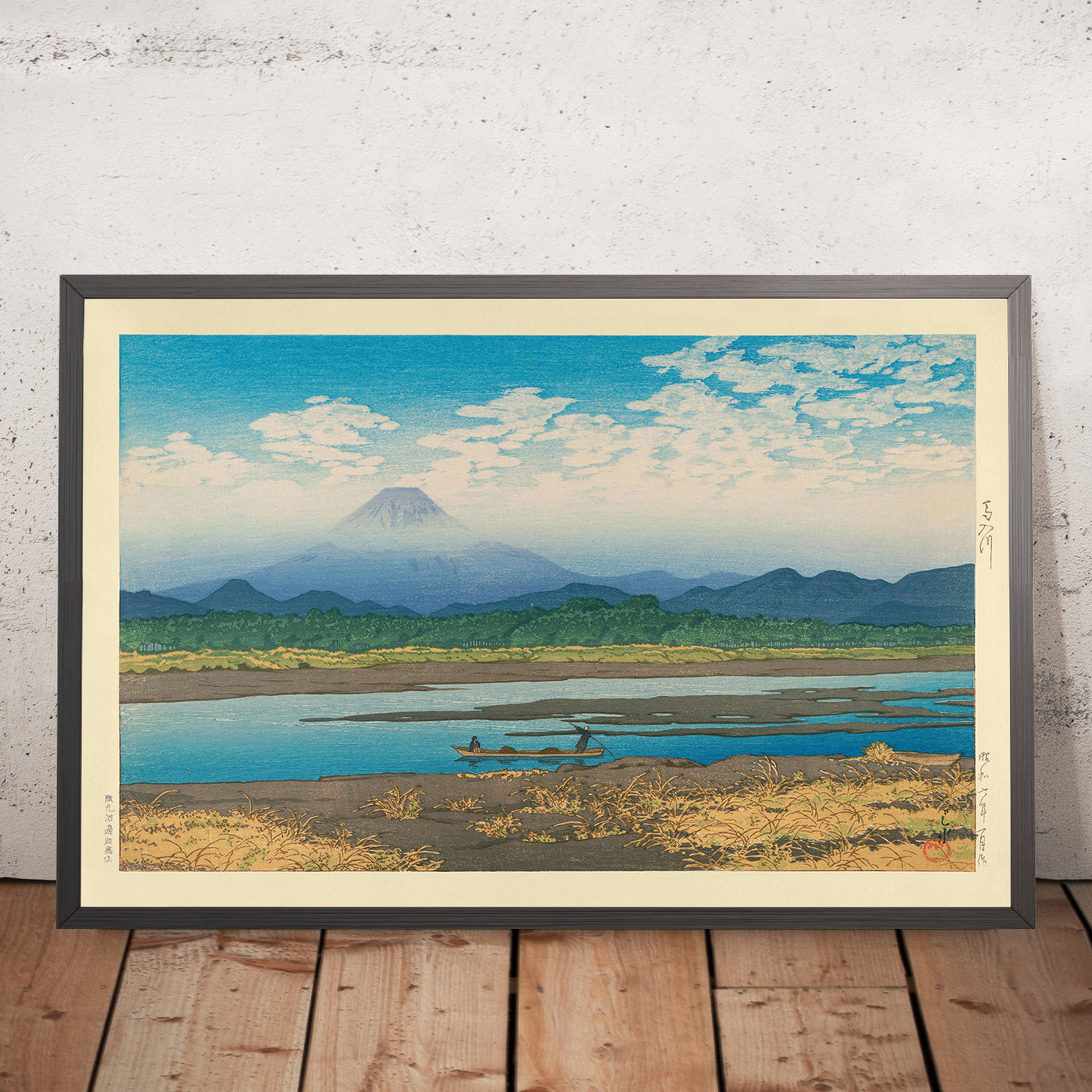 A framed image of Mt. Fuji from Banyu River by Hasui Kawase, 1935