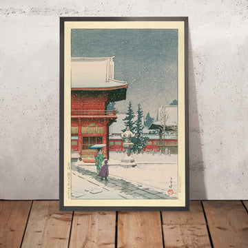 Ein gerahmtes Bild von Schnee am Nezu-Gongen-Schrein von Hasui Kawase, 1935