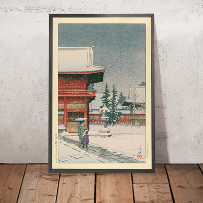 A framed image of Snow at Nezu Gongen Shrine by Hasui Kawase, 1935