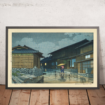 A framed image of Nissaka in the Rain by Hasui Kawase 1942