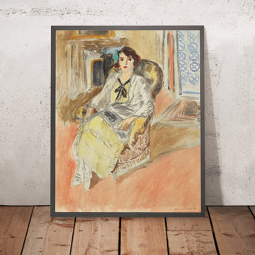 Ein gerahmtes Bild von Jeune fille assise, robe jaune (Sitzendes junges Mädchen, gelbes Kleid) von Henri Matisse, 1912
